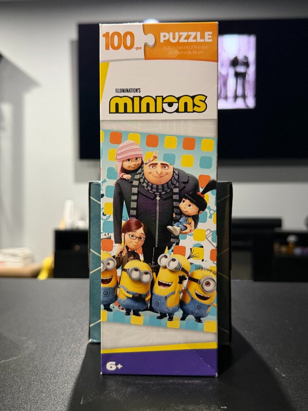 Illumination's Minions 100-Piece Jigsaw Puzzle featuring Gru and his family